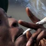 Nigerian man smoking marijuana