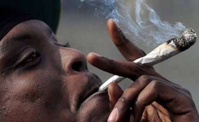 Nigerian man smoking marijuana