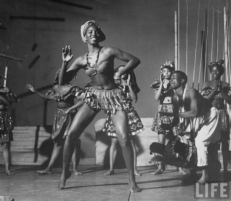 African music dancers performing with Fela